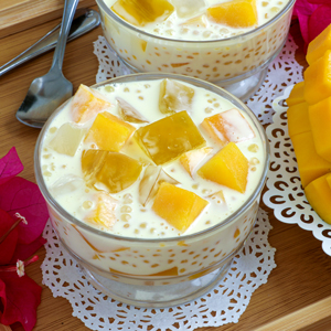 Creamy Mango Jelly with juicy and sweet mango cubes, mango-flavored jelly, nata de coco and mini tapioca pearls.