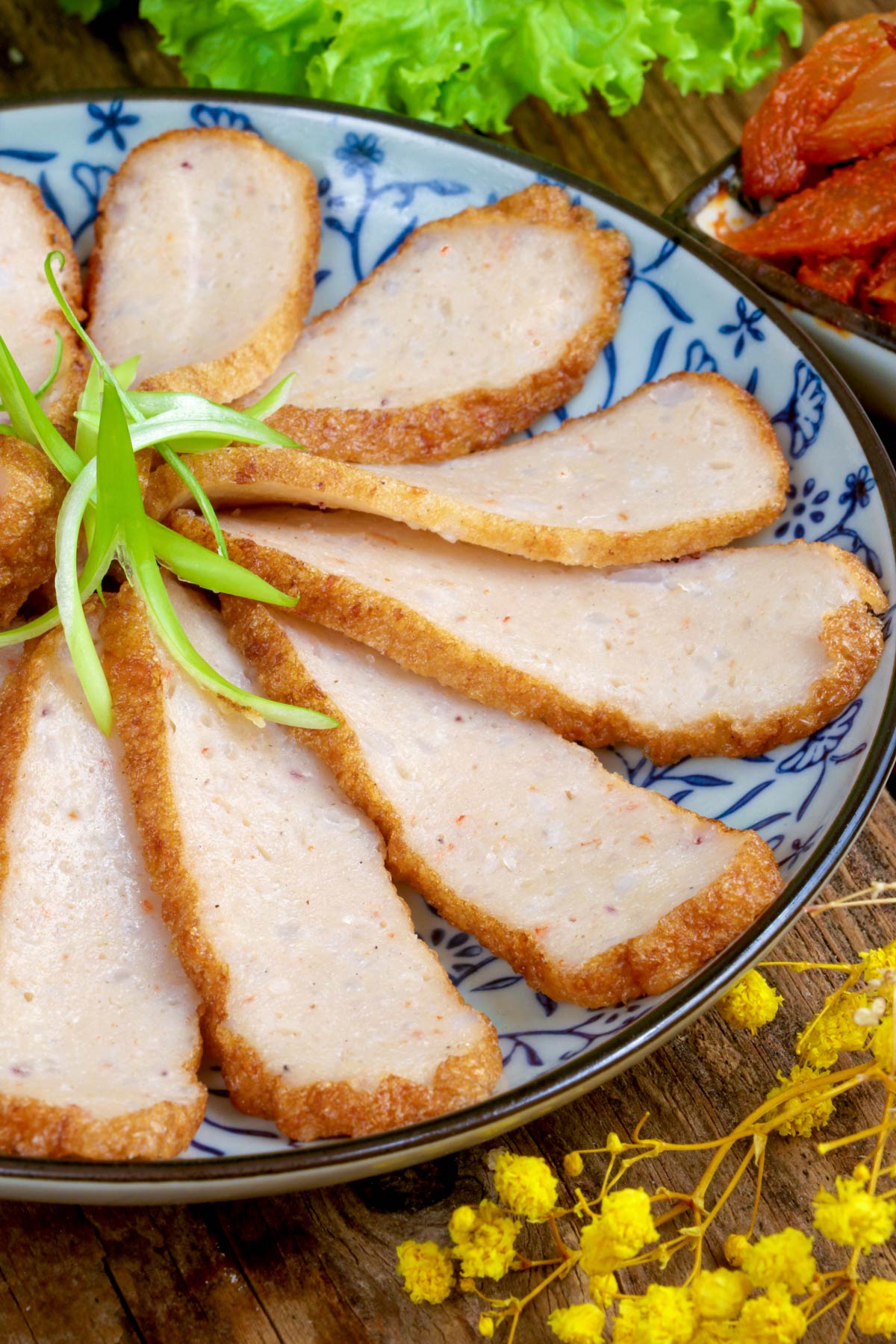 Sliced Korean Fish on a serving plate.