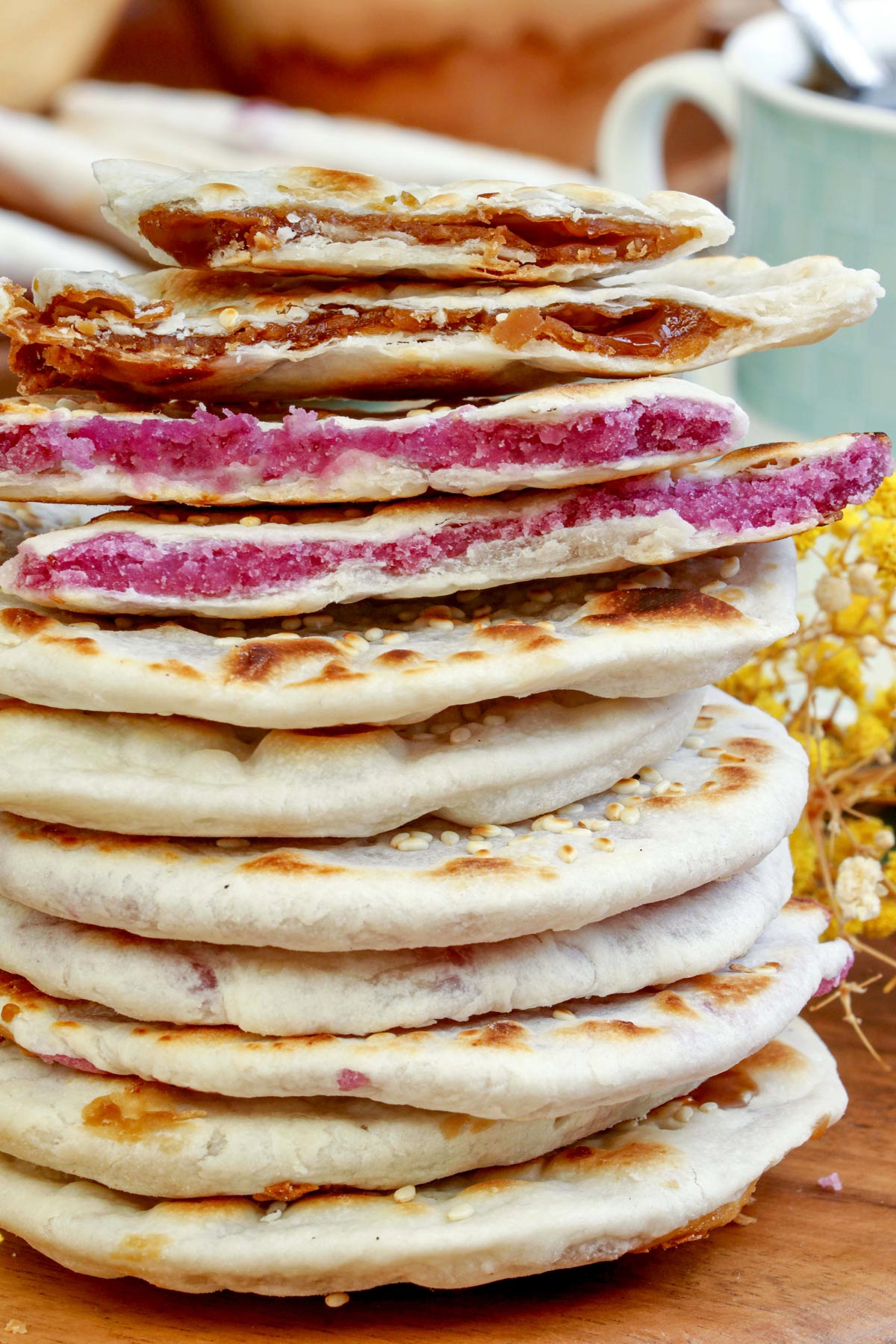 Stacked Piaya in classic and ube flavors.