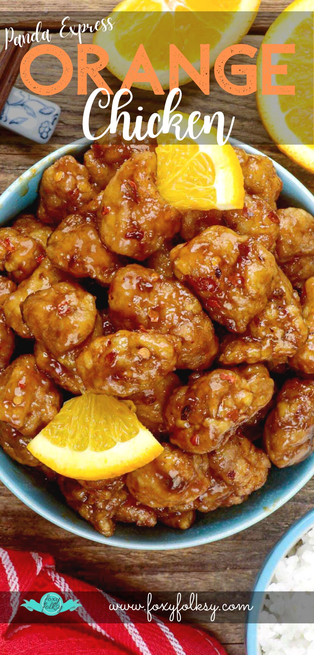 Orange Chicken in a serving bowl served with steamed rice.