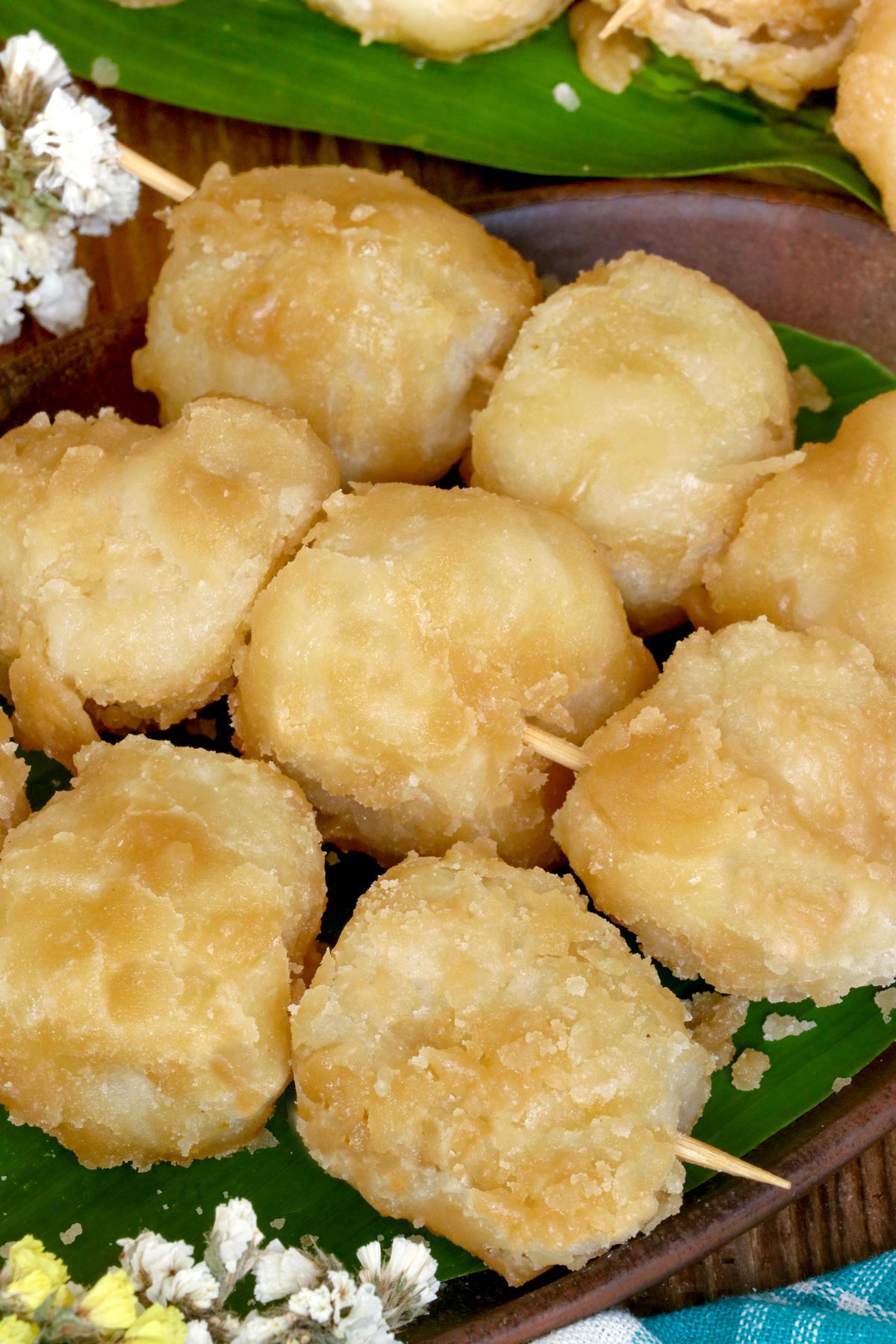 Sweet fried rice balls coated with caramelized sugar.