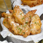 Crispy chicken wings tossed in a mouthwatering garlic-parmesan coating.