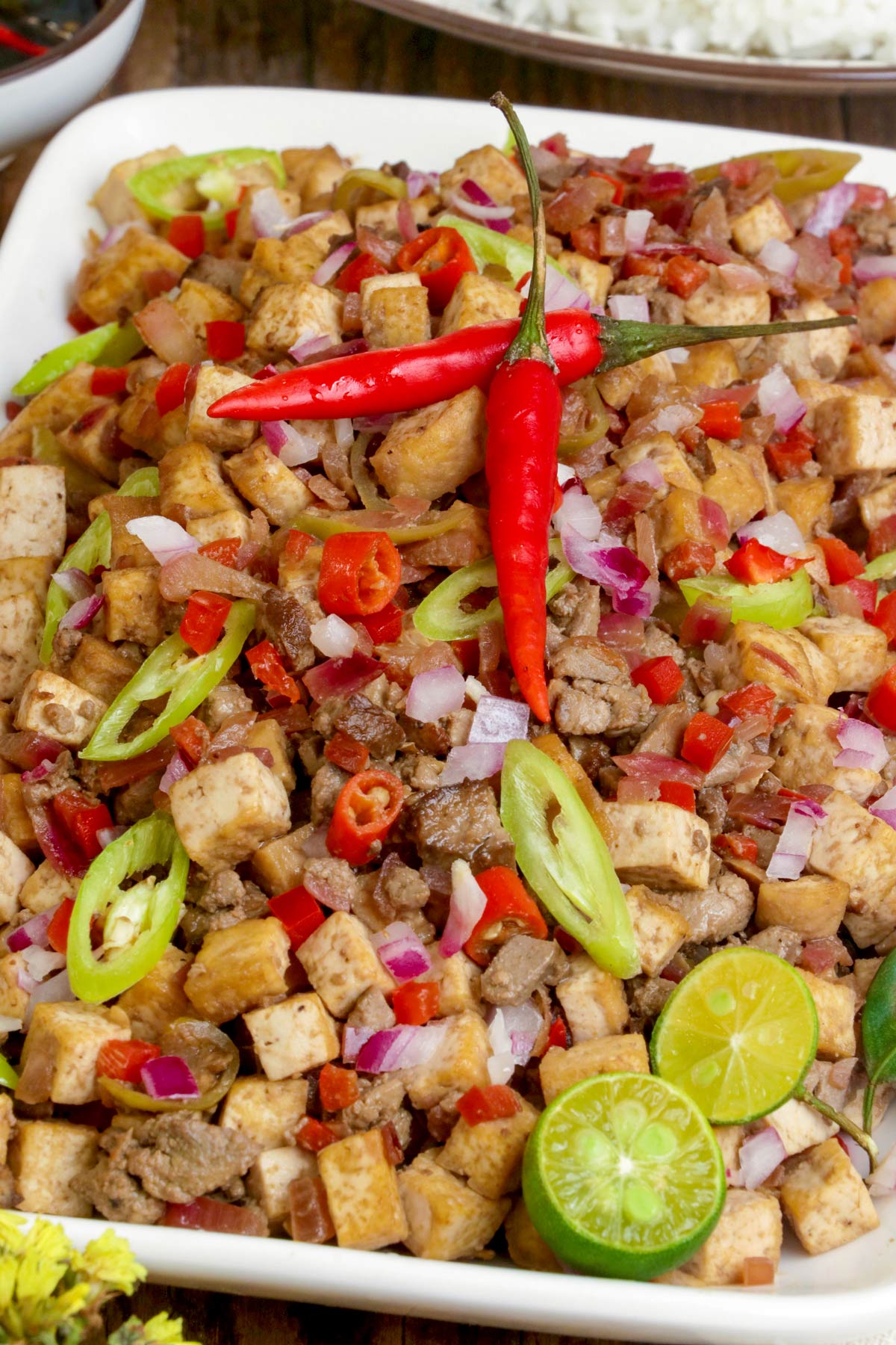 Crispy deep-fried tofu cubes, with chopped chicken liver, onion, bell pepper, and chilis.