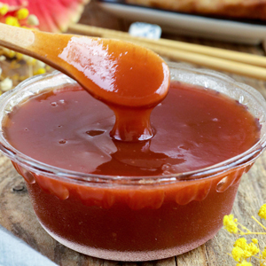 Homemade sweet and sour sauce in a bowl.