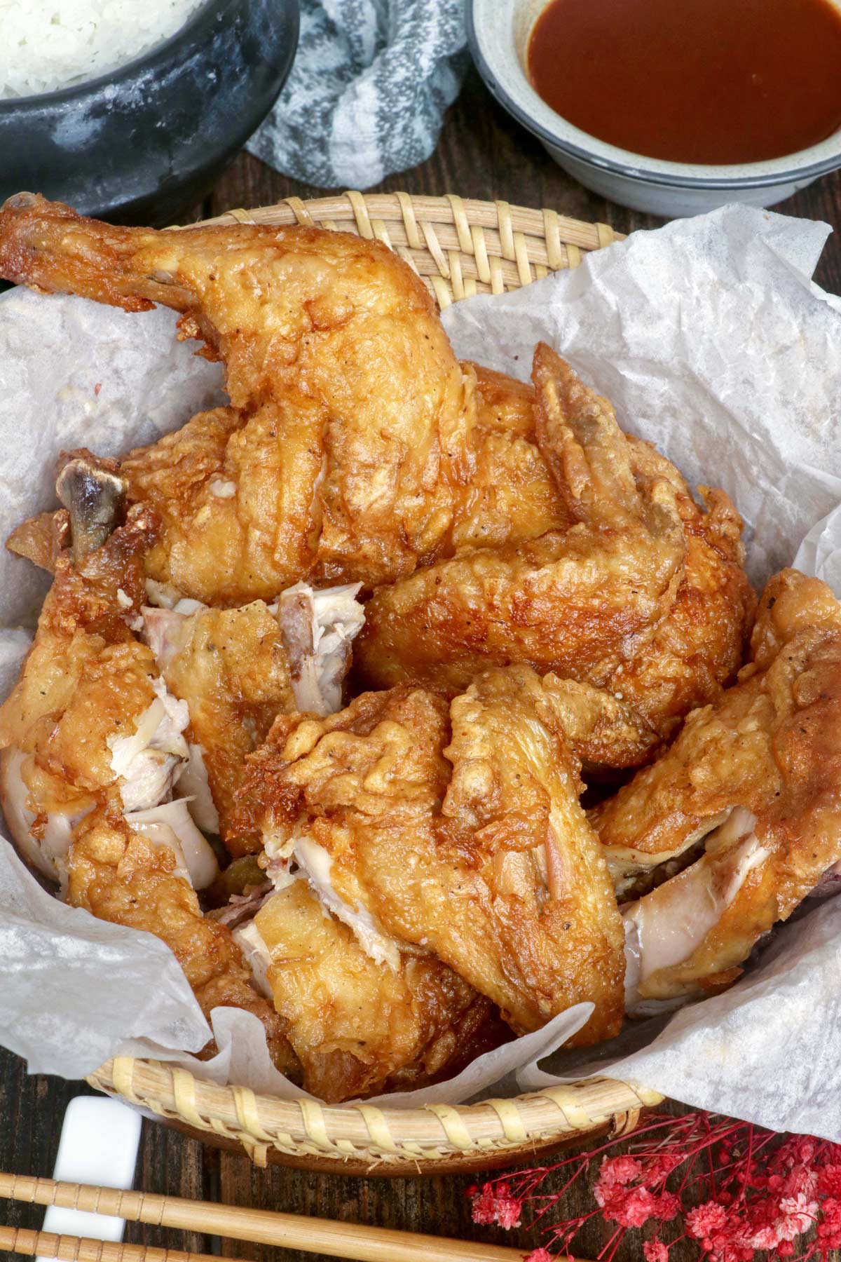 Chopped fried chicken on a serving platter.