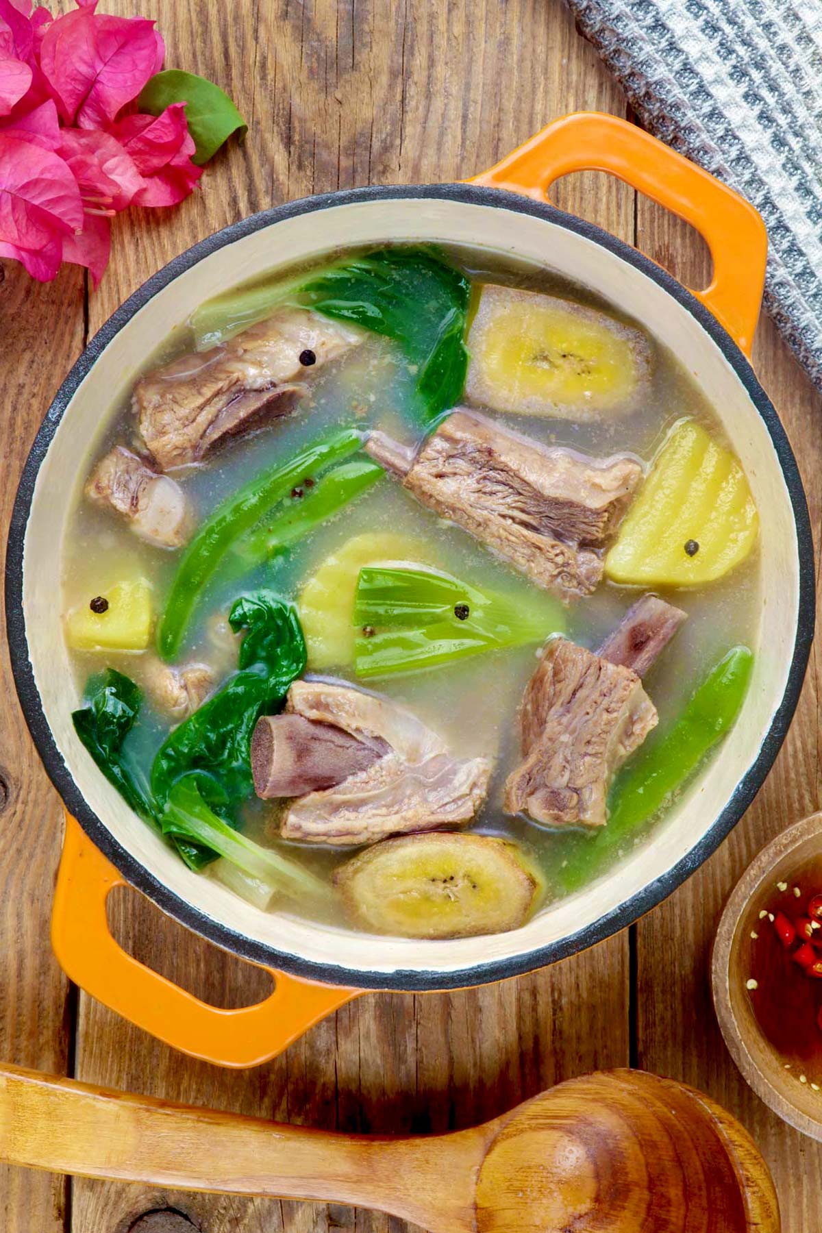 Nilagang Baboy in a pot made with pork ribs, potatoes, pechay, green beans,and leek.