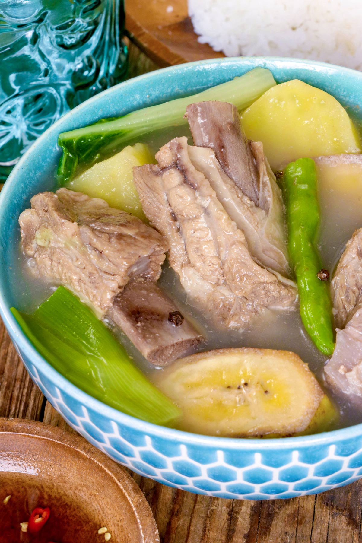 Hearty Pork Nilaga made with pork ribs, potatoes, saba bananas. green beans and leek.