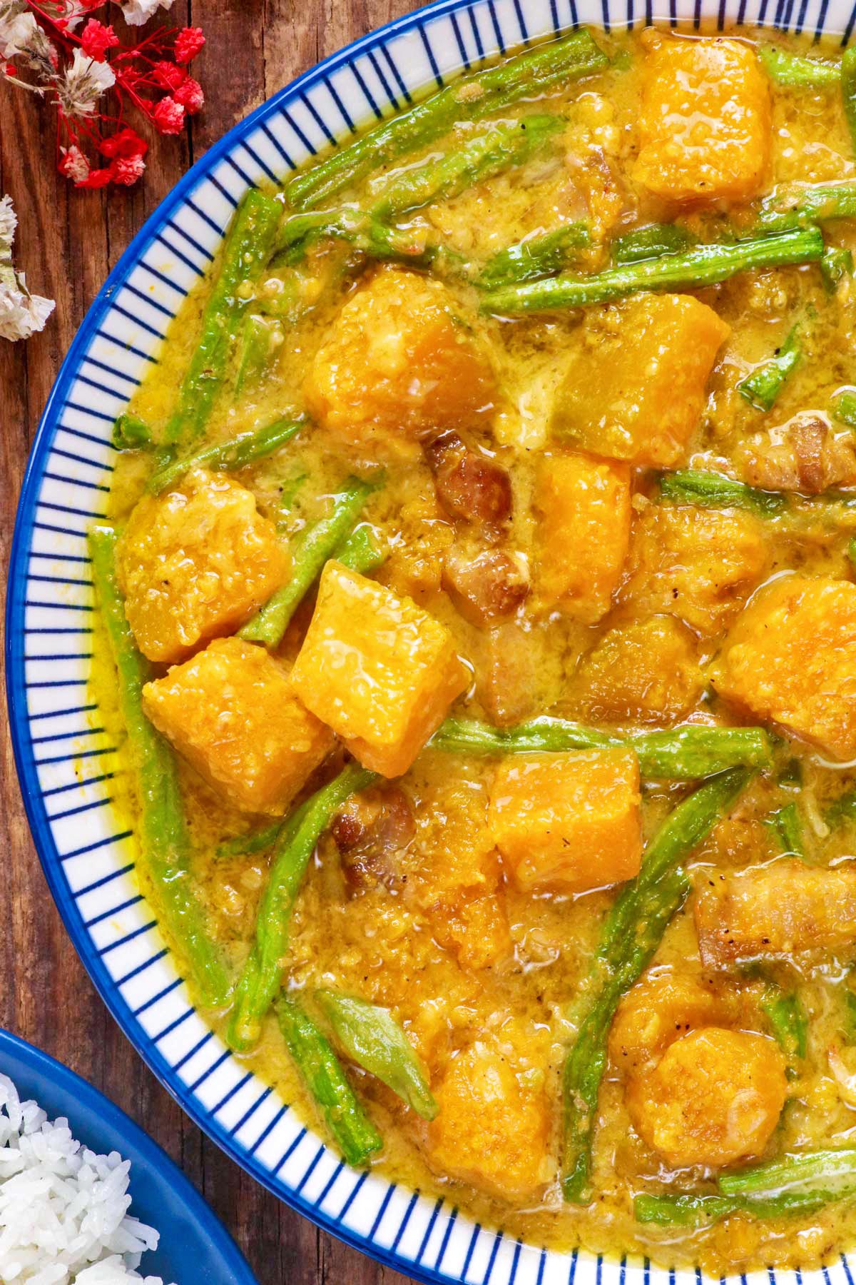 Sweet and tender kalabasa chunks with sitaw in a creamy and rich sauce.
