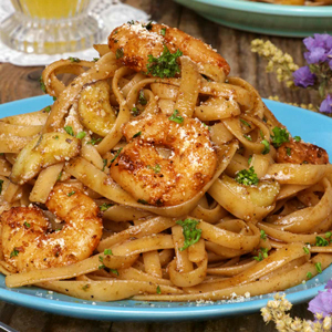 Cajun shrimp pasta on a serving plate.
