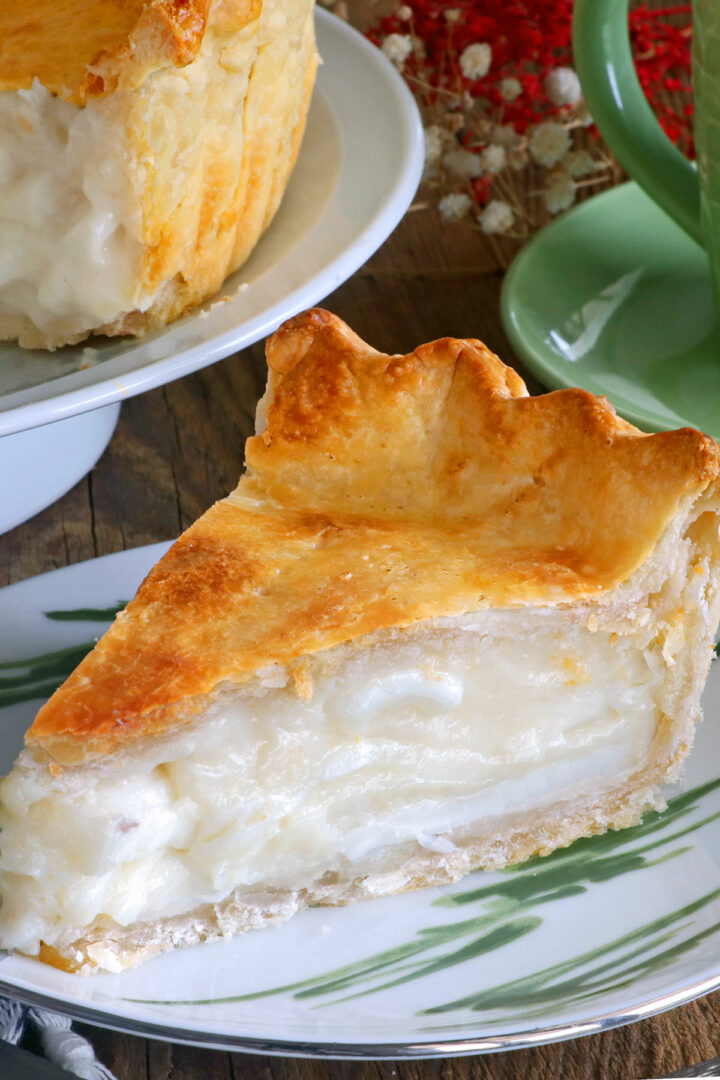 A slice of Buko Pie or Coconut Pie showing the layers of coconut meat in creamy filling.