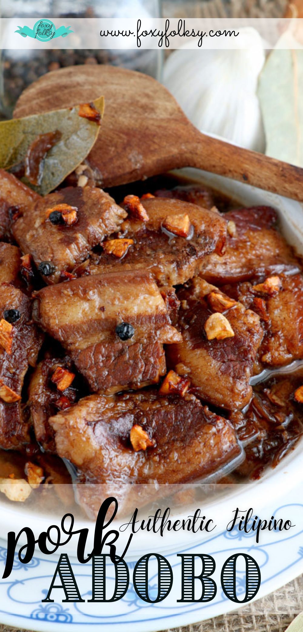 Authentic Filipino Pork Adobo in a platter with serving spoon on the side.