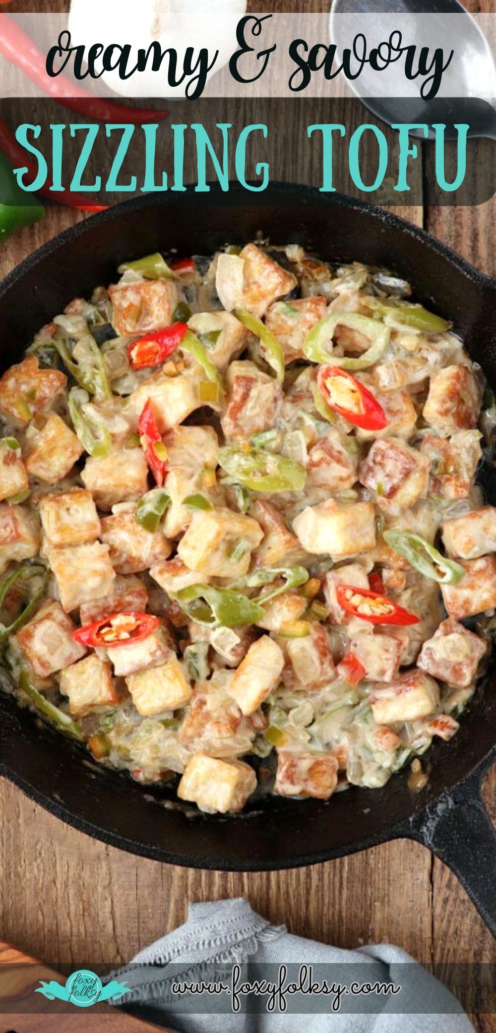 Creamy,savory, and crispy tofu cubes in a sizzling plate. 