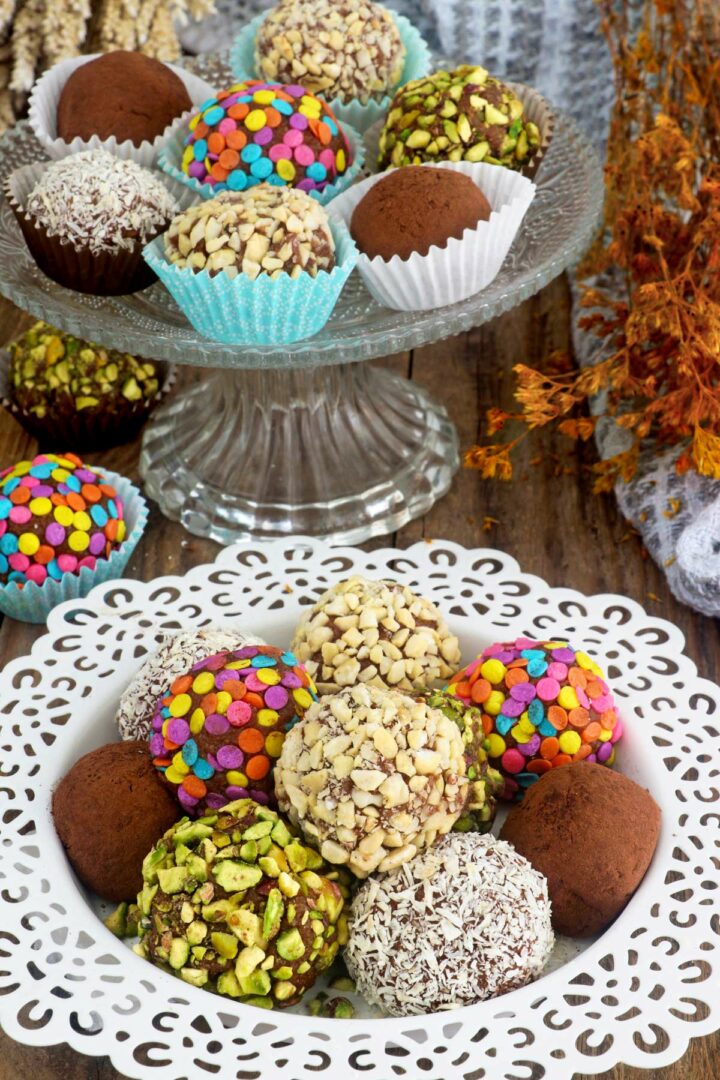 Graham balls in a serving plate with assorted coating.