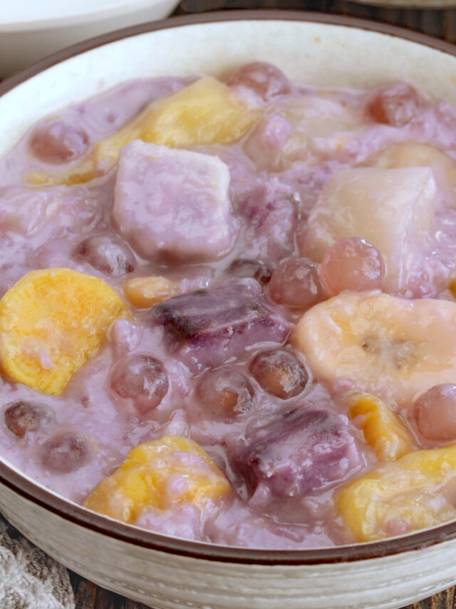 Binignit in a serving bowl with ube, taro, cassava, banana, langka, sago and glutinous rice.