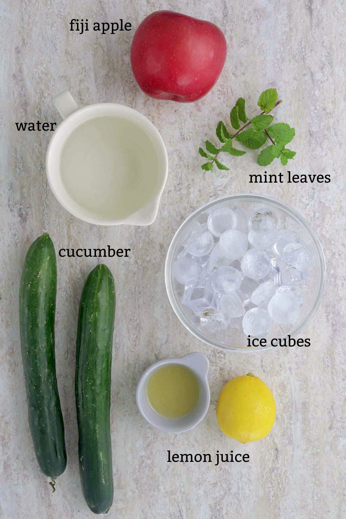 Ingredients needed to make cucumber juice.
