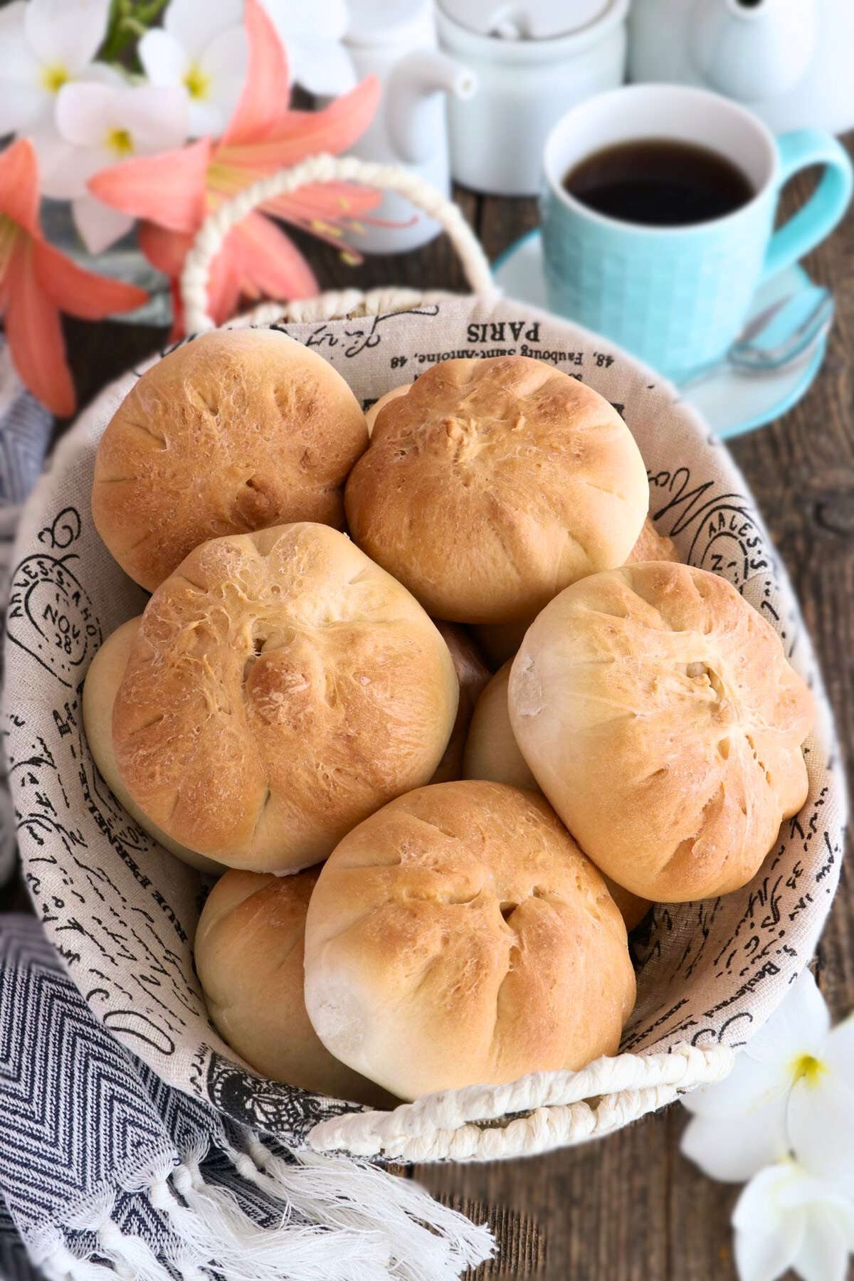 Siopao Tostado in a bread basket basked until crisp, golden brown.