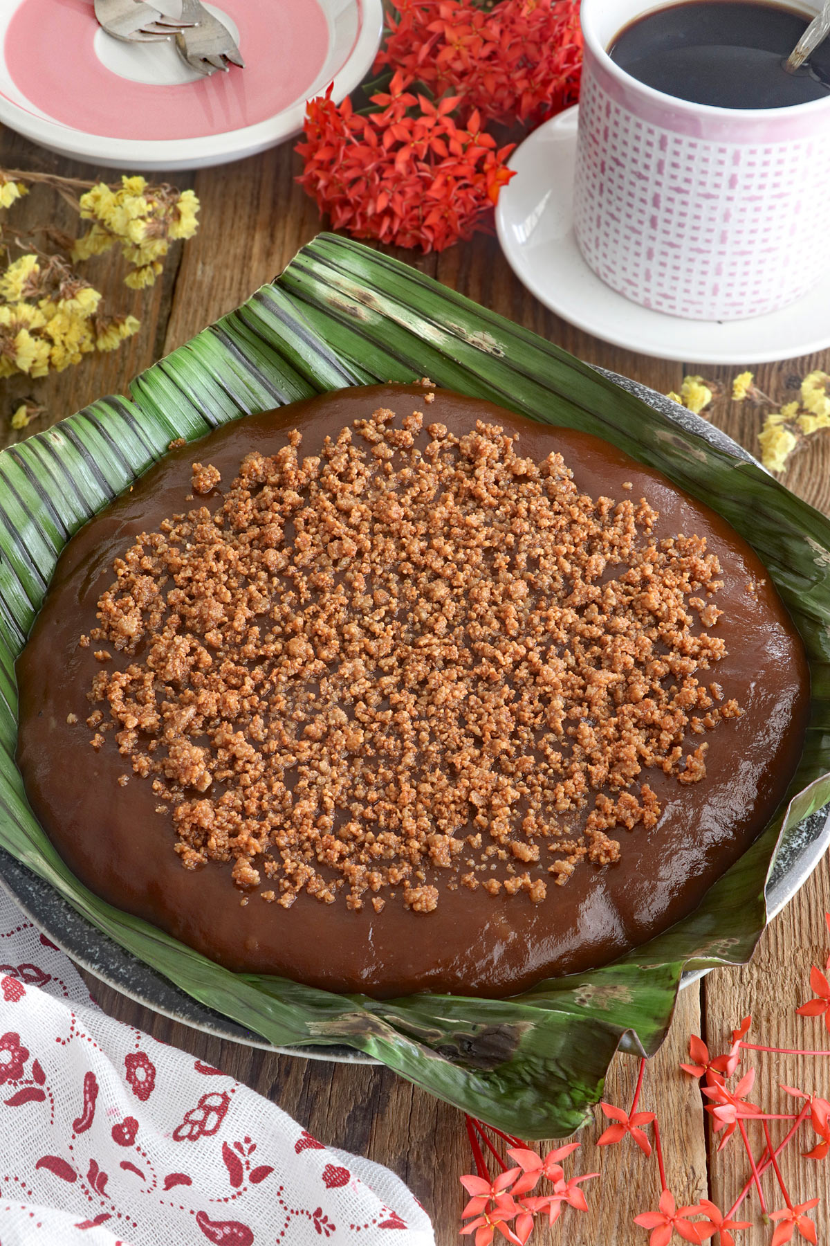 Kalamay hati on banana leaves with coconut curds (latik) toppings.