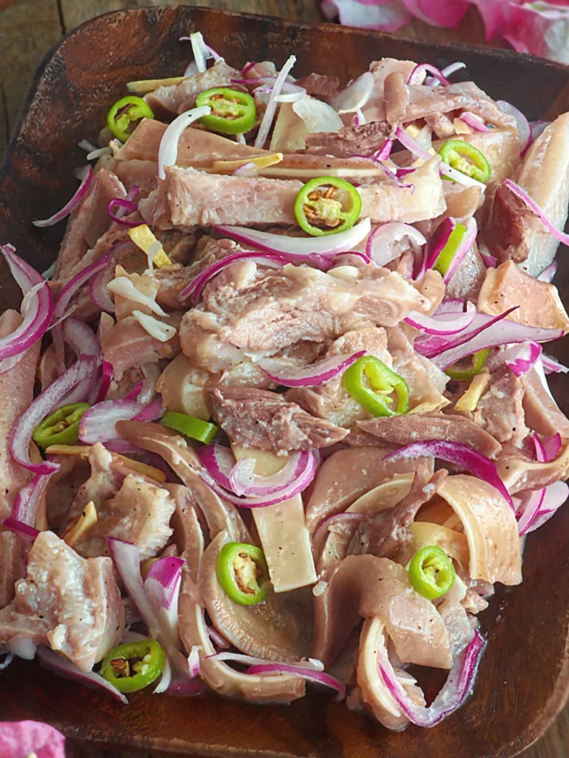 Sisig Matua, a dish of boiled pork mask and ears marinated in vinegar, pepper, onion, and chilies.