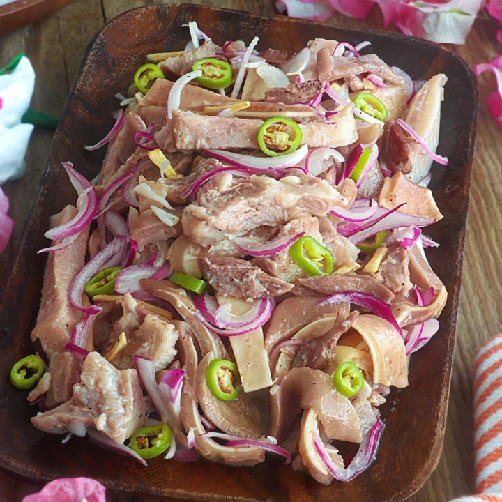 Sisig Matua, a dish of boiled pork mask and ears marinated in vinegar, pepper, onion, and chilies.